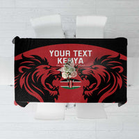 Red and black rugby-style tablecloth with Kenya text and lion graphic