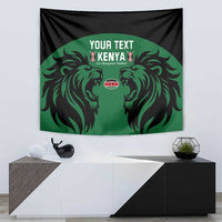 Rectangular tapestry with black background, green emblem panel, lion-head silhouettes and Kenya text