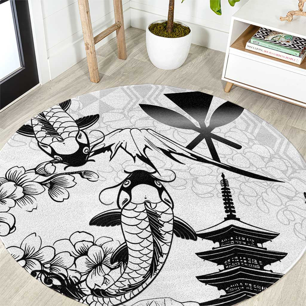 Round white-and-gray area rug with black koi fish, sakura flowers, and Japanese pagodas