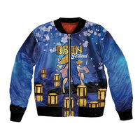 Blue unisex bomber jacket with front zipper, lantern and cherry blossom print