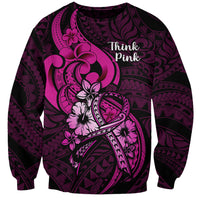 Black sweatshirt with pink Polynesian ribbon graphic and 'Think Pink' lettering