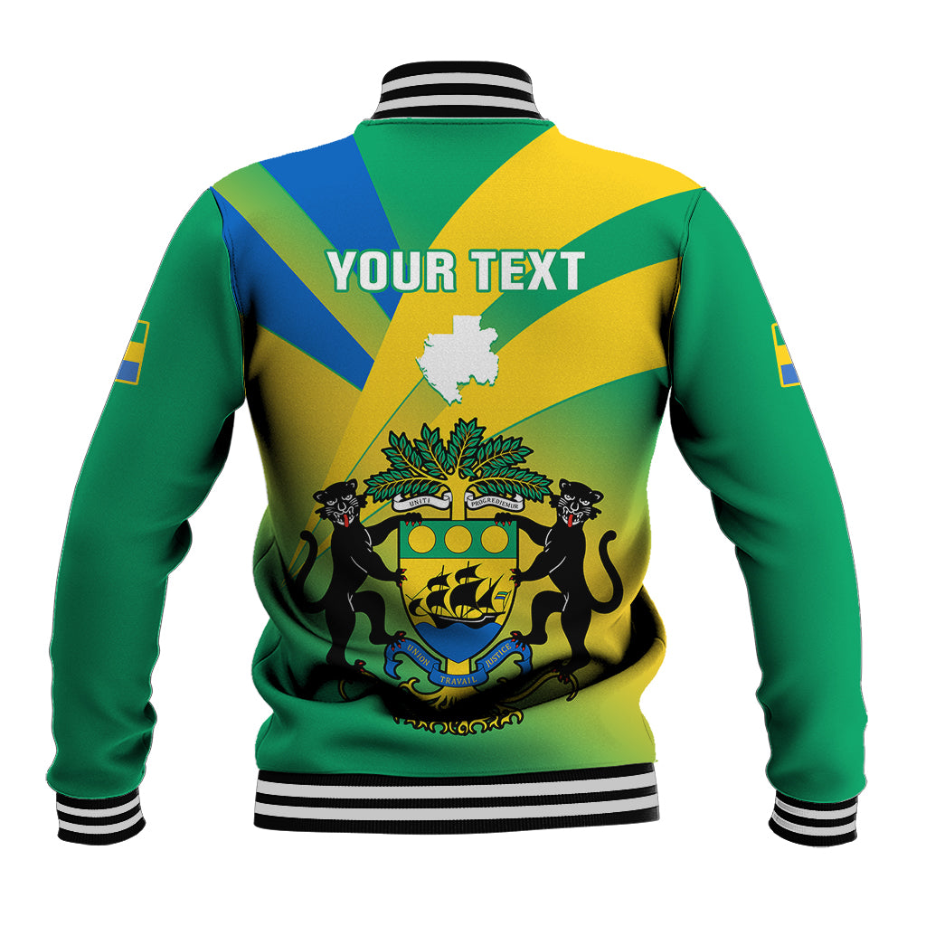 Back of green varsity jacket with blue-yellow diagonal panels, coat-of-arms crest, striped cuffs