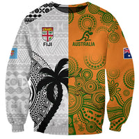 Unisex rugby sweatshirt with orange-green patterned front, black palm motif, flags