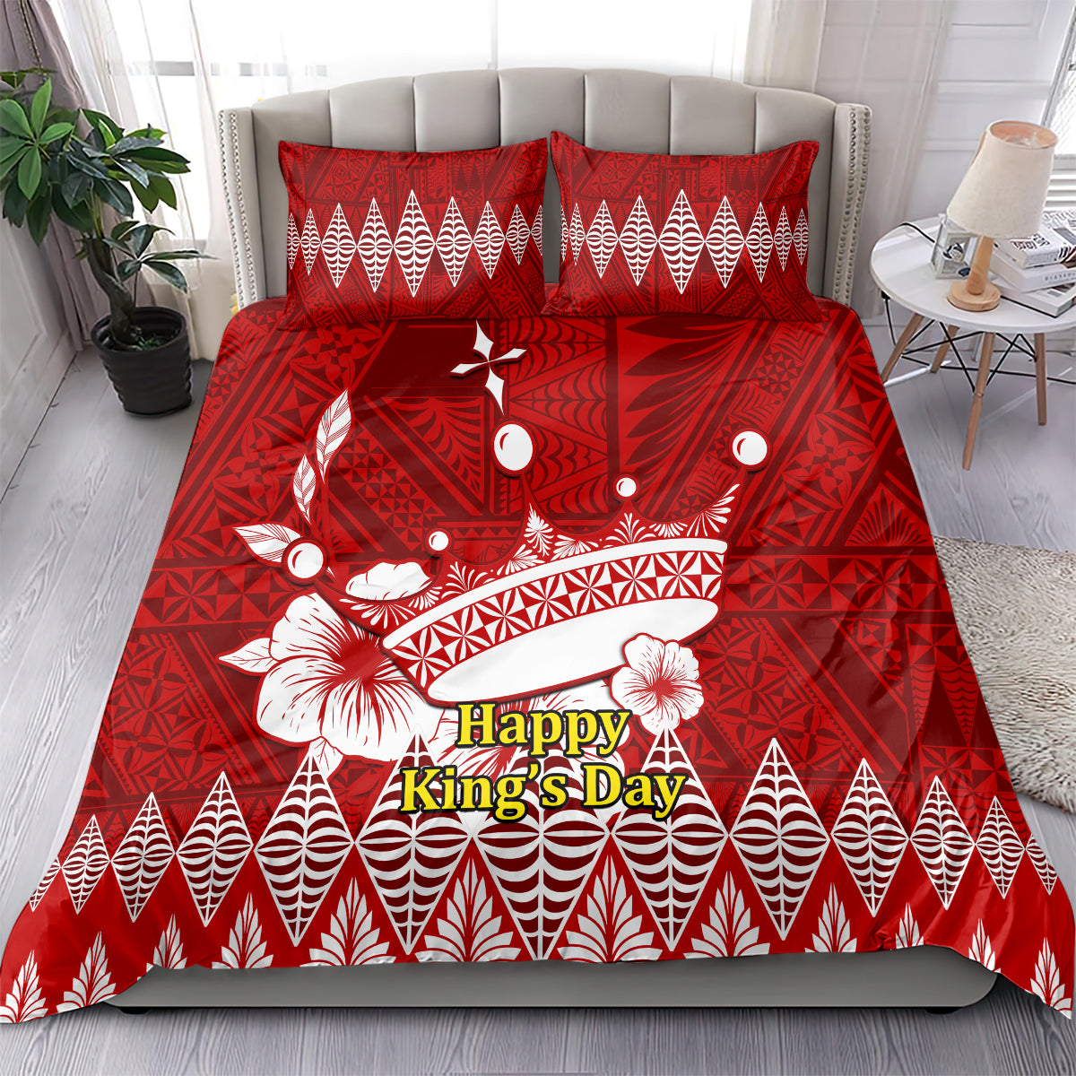 Red bedding set with Tonga Ngatu crown design; 'Happy King's Day' text on comforter, two pillows