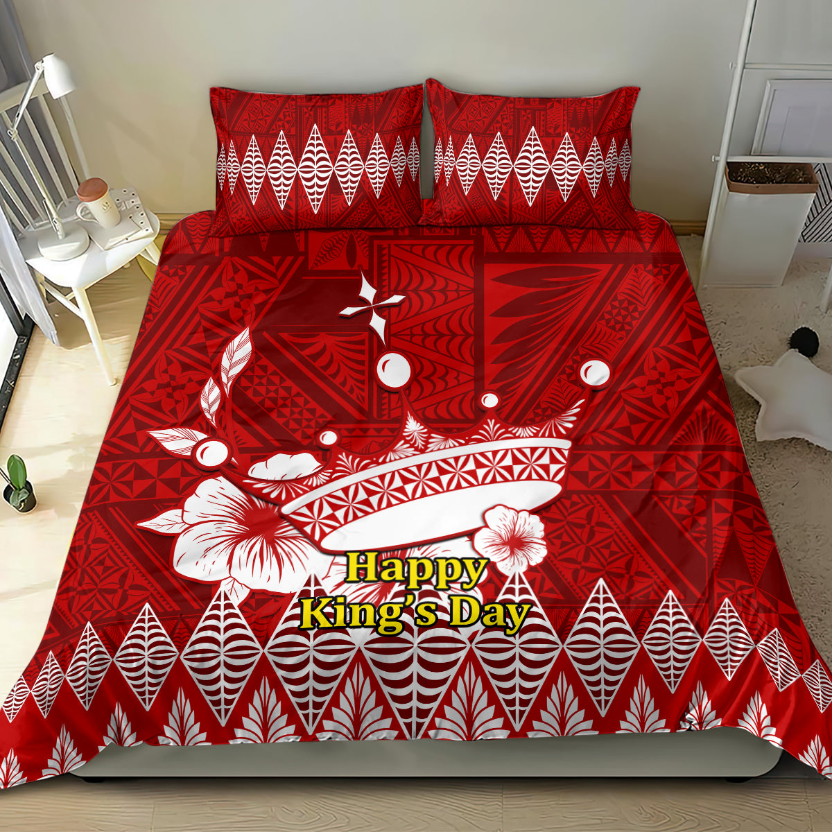 Red bedding set featuring Tonga Ngatu crown artwork; 'Happy King's Day' on comforter with two pillows