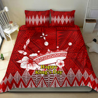 Red bedding set featuring Tonga Ngatu crown artwork; 'Happy King's Day' on comforter with two pillows