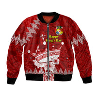 Red bomber jacket with crown emblem, Tongan ngatu pattern, ribbed cuffs and hem