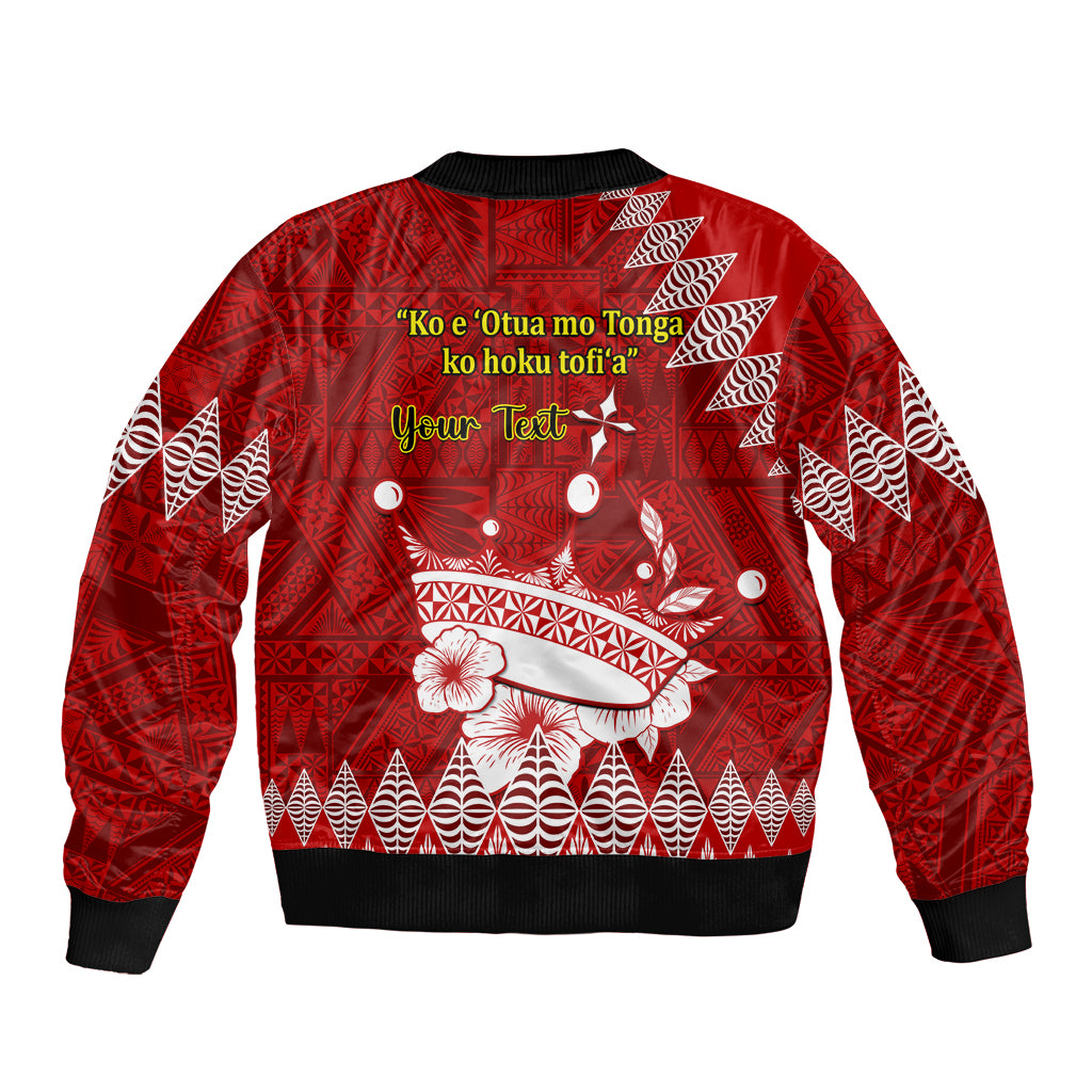 Red bomber jacket with white Tongan ngatu pattern and printed lyrics on back