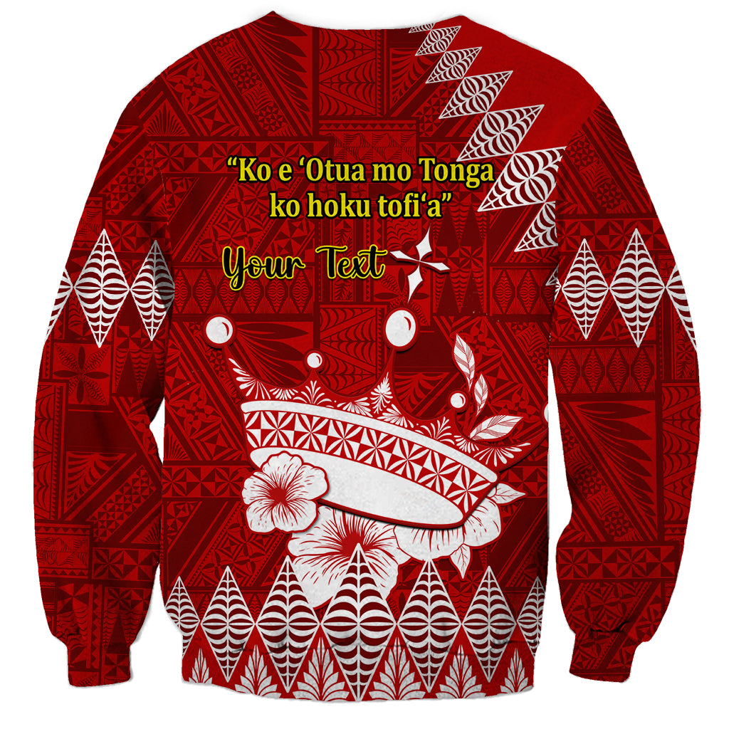 Red crewneck sweatshirt with Tongan pattern, arm graphic, and 'Your Text' personalization