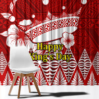 Red window curtain close-up with white geometric motifs and Happy King’s Day lettering