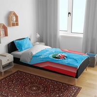 Blue and red cricket-themed bedding set with duvet cover and two pillowcases on a bed