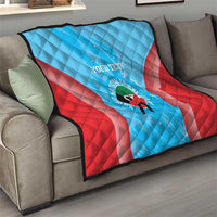 Cricket quilt draped over sofa: light blue and red stripes with custom text and circular logo