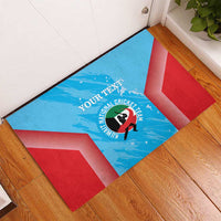 Corner view of blue and red cricket-themed rubber doormat with player emblem and custom text