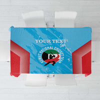 Blue and red cricket-themed tablecloth with central emblem and grunge-style texture