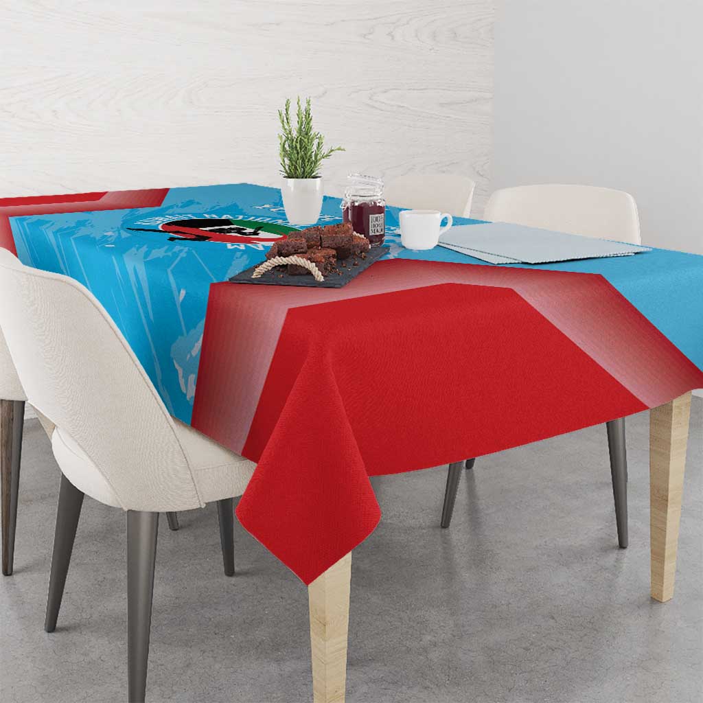 Cricket-themed tablecloth in blue with red corner drop and patterned surface