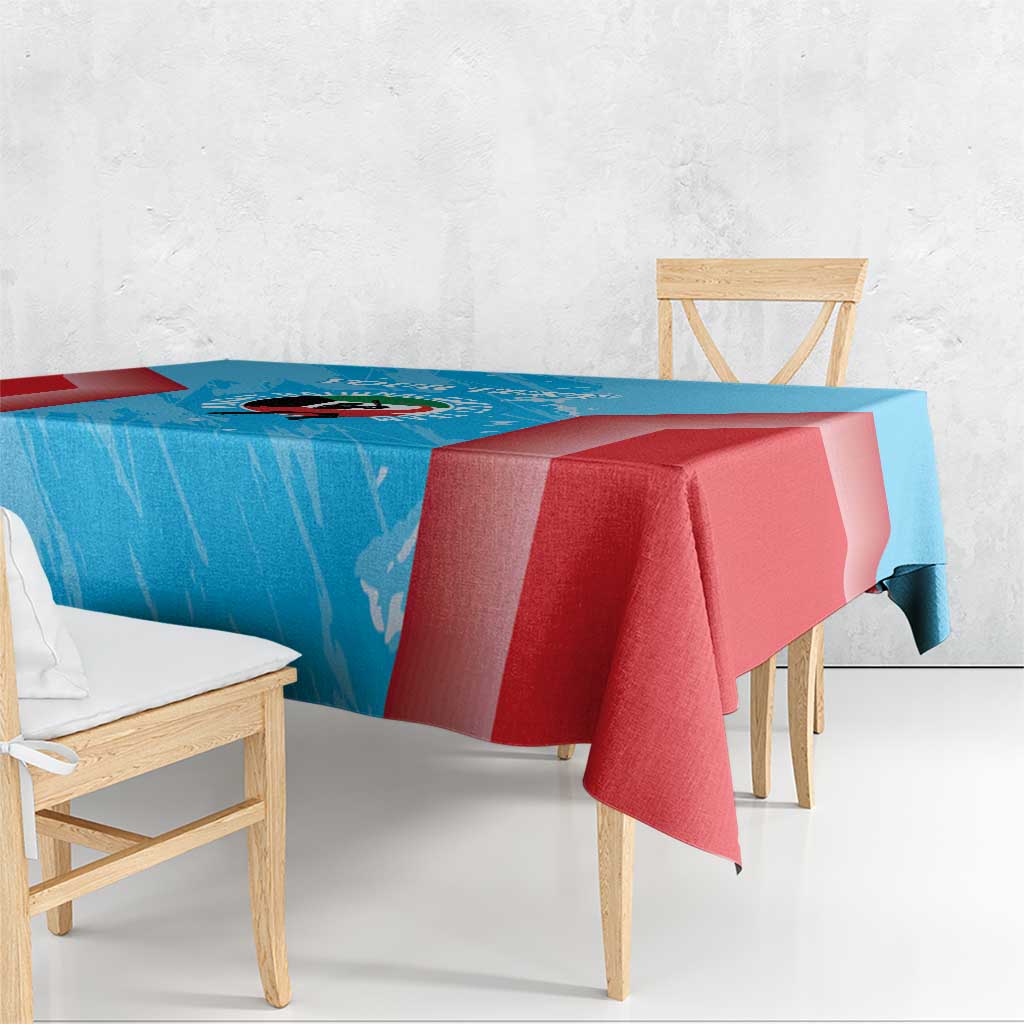 Blue and red cricket tablecloth with seam detail and draped corners on furniture