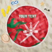 Red round beach blanket with white fringe, Oman crest and custom text area