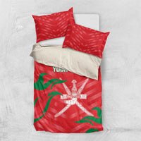 Red bedding set with green flag waves and crossed swords emblem; two red pillowcases included.