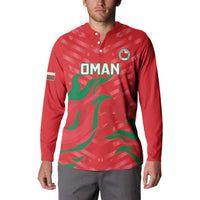Red button-front sweatshirt with Oman emblem, OMAN text, and green flag wave print