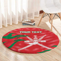 Red round carpet rug with green accents and white cross emblem in center