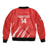 Red bomber jacket back with black ribbed hem, 'YOUR TEXT 14' cricket print
