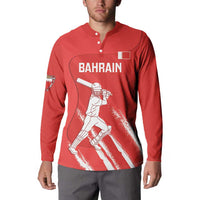 Red button cricket sweatshirt on model, front BAHRAIN and batsman graphic