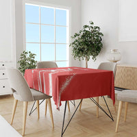 Red cricket tablecloth with white distressed stripe pattern and draped table coverage
