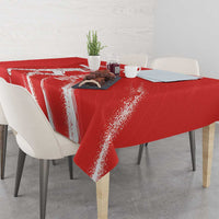 Red cricket tablecloth with white textured stripes and printed player graphic on top