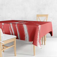 Red cricket tablecloth with white distressed vertical stripes and hanging corner drape