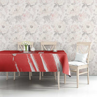 Red cricket tablecloth with white distressed stripe design over dining table
