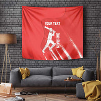 Red cricket-themed tapestry with player graphic and vertical “BAHRAIN” text, plus “YOUR TEXT”