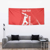 Red cricket tapestry with batsman artwork, distressed “BAHRAIN” text, and “YOUR TEXT”