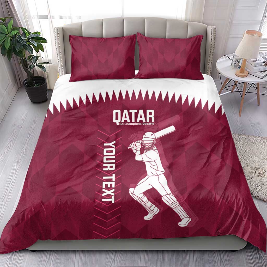 Maroon duvet cover and pillowcases set with Qatar text, cricket player, and bat design