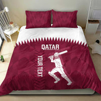 Maroon duvet cover and pillowcases with Qatar text and cricket batter illustration