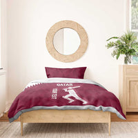Maroon duvet cover with Qatar text and cricket player design; matching pillowcases