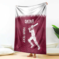 Maroon Qatar cricket blanket draped with central player illustration and bold “YOUR NEXT”