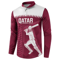 Maroon and white Qatar button sweatshirt, front view with helmet player and Qatar text