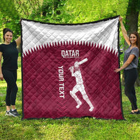Qatar cricket quilt, maroon and white diamond quilted design with Qatar crest and batsman