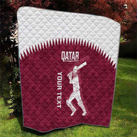 Maroon Qatar cricket quilt with white diamond stitching, Qatar text, and cricket player graphic