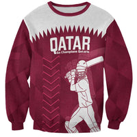 Maroon cricket sweatshirt with white neckline and Qatar graphic front print