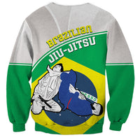Green and gray sweatshirt with Brazil Jiu-Jitsu back graphic of grappling fighters.