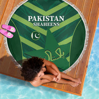 Green round beach blanket with Pakistan Shaheens text and crescent star emblem, white fringe