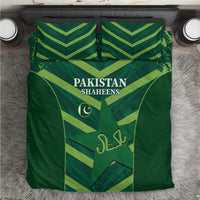 Green bedding set with Pakistan Shaheens text and crescent emblem on duvet, matching pillow shams