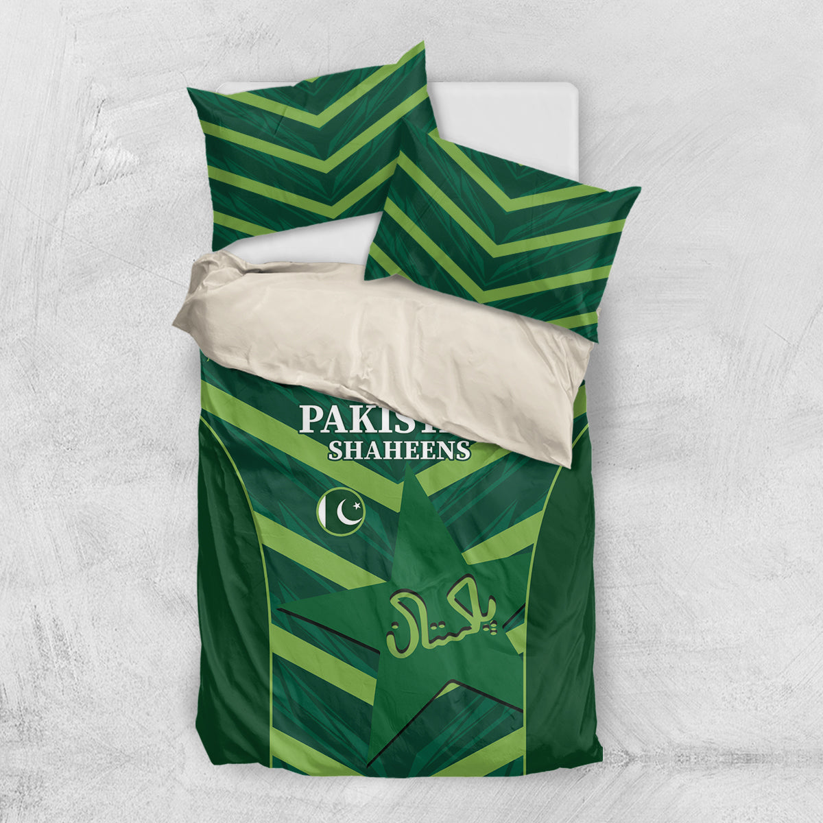 Green bedding set flat lay with Pakistan Shaheens duvet and chevron pillowcases