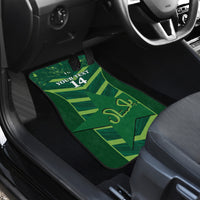 Green car floor mat with chevron design and number 14 graphic in the back seat area