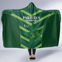 Green hooded blanket with Pakistan Shaheens crest, hood up, cape-like drape