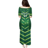 Green long dress with back number print 14 and chevron pattern