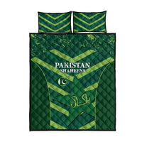 Green Pakistan Shaheens quilt bed set with two pillows, quilt centered with crescent emblem