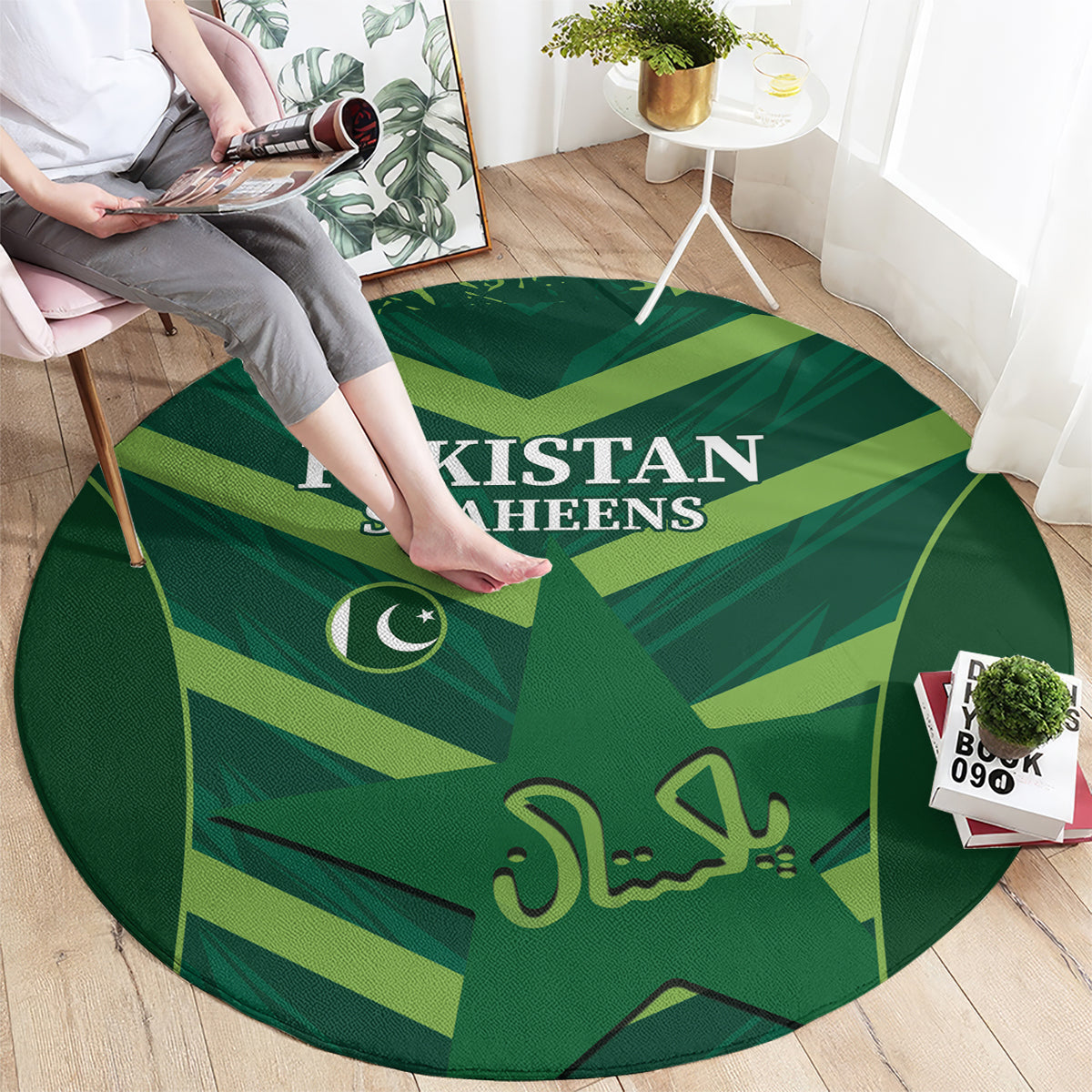 Green round carpet with Pakistan Shaheens logo and crescent, calligraphy center graphic