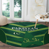 Green round carpet with Pakistan Shaheens text and crescent emblem in geometric rays